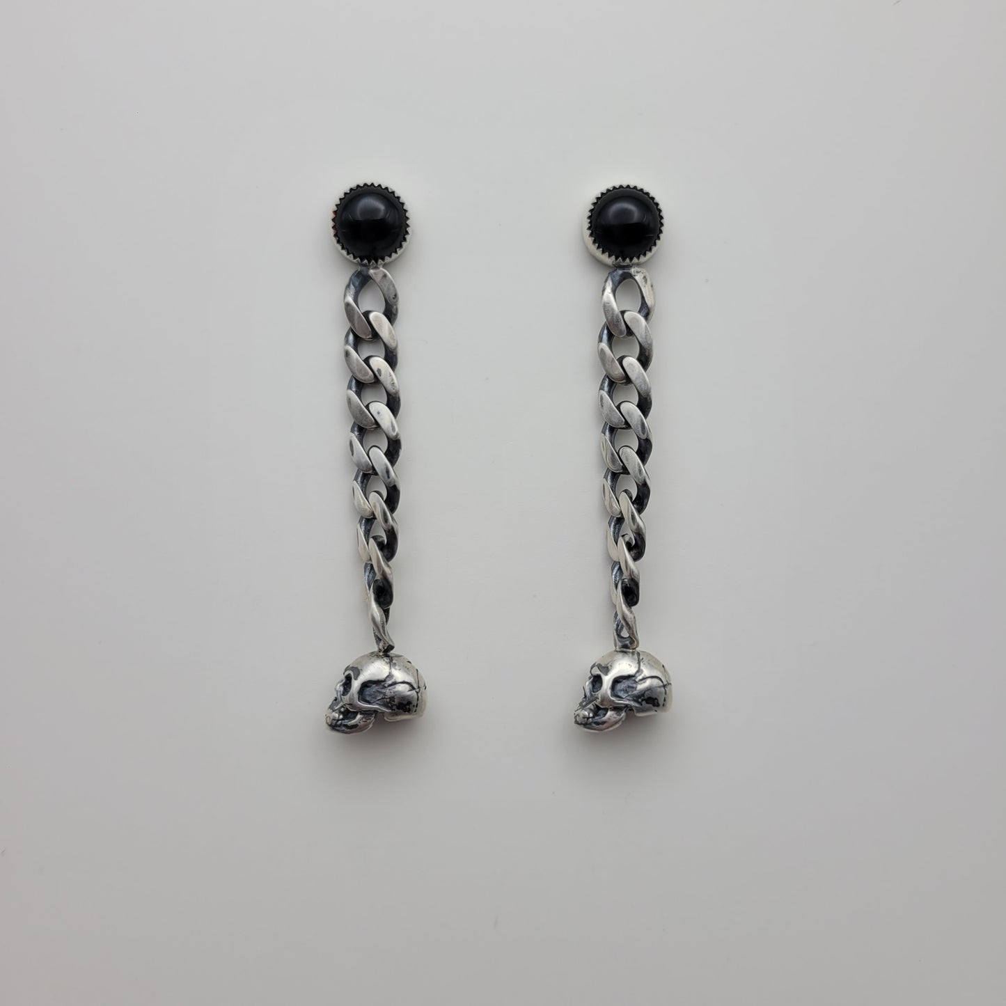 Onyx & chain earrings with skulls