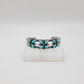 Turquoise flower cuff