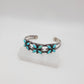 Turquoise flower cuff